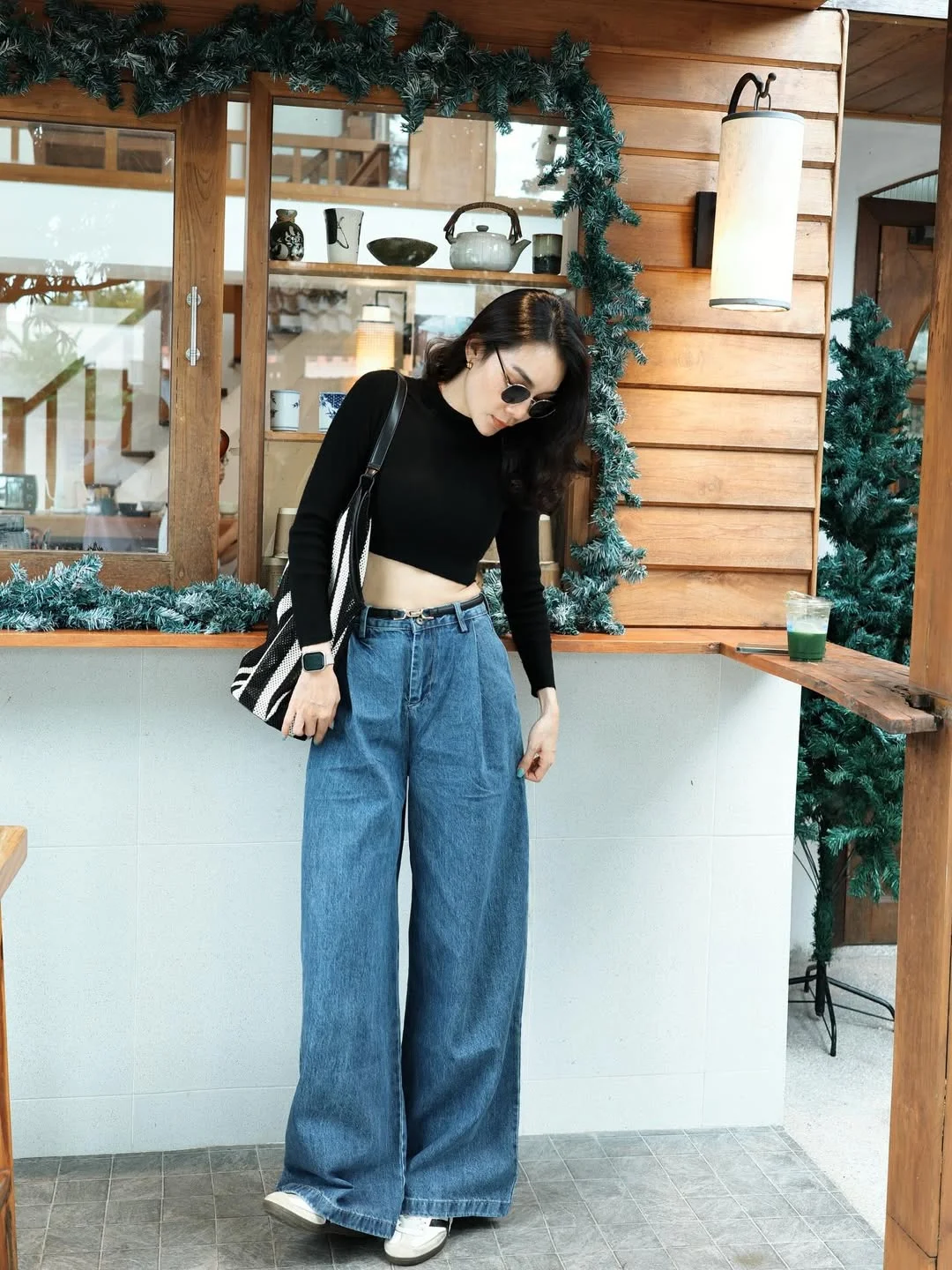 fall outfits with jeans 2026 Minimal Black Knit with Flowing Wide-Leg Denim