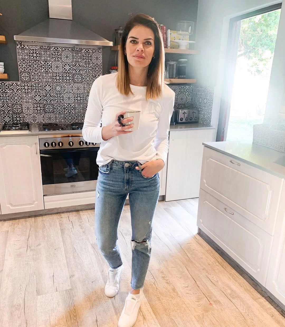 fall outfits with sneakers and jeans 2026 Simple White Tee and Distressed Denim for Everyday Fall Comfort