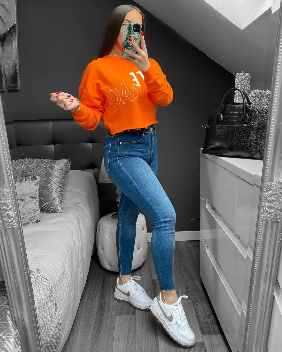 fall outfits with sneakers and jeans 2026 Bright Orange Sweatshirt and White Sneakers for Casual Weekend Style