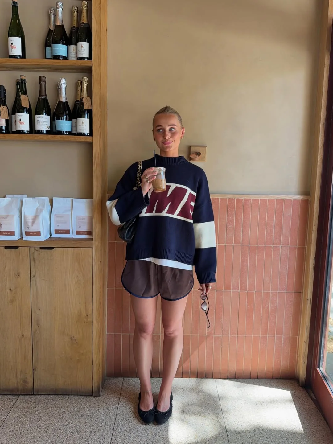 fall outfits with sweater 2026 Sporty Knitwear Creates an Unexpected Early Fall Look