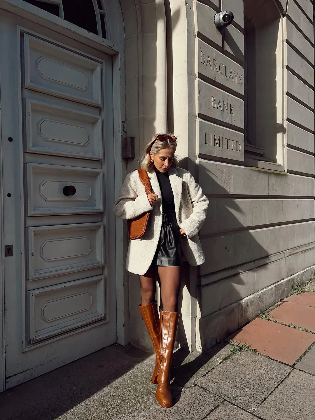 fall outfits with tights and skirt 2026 Cozy Teddy Coats and Leather Minis With Classic Tall Boots