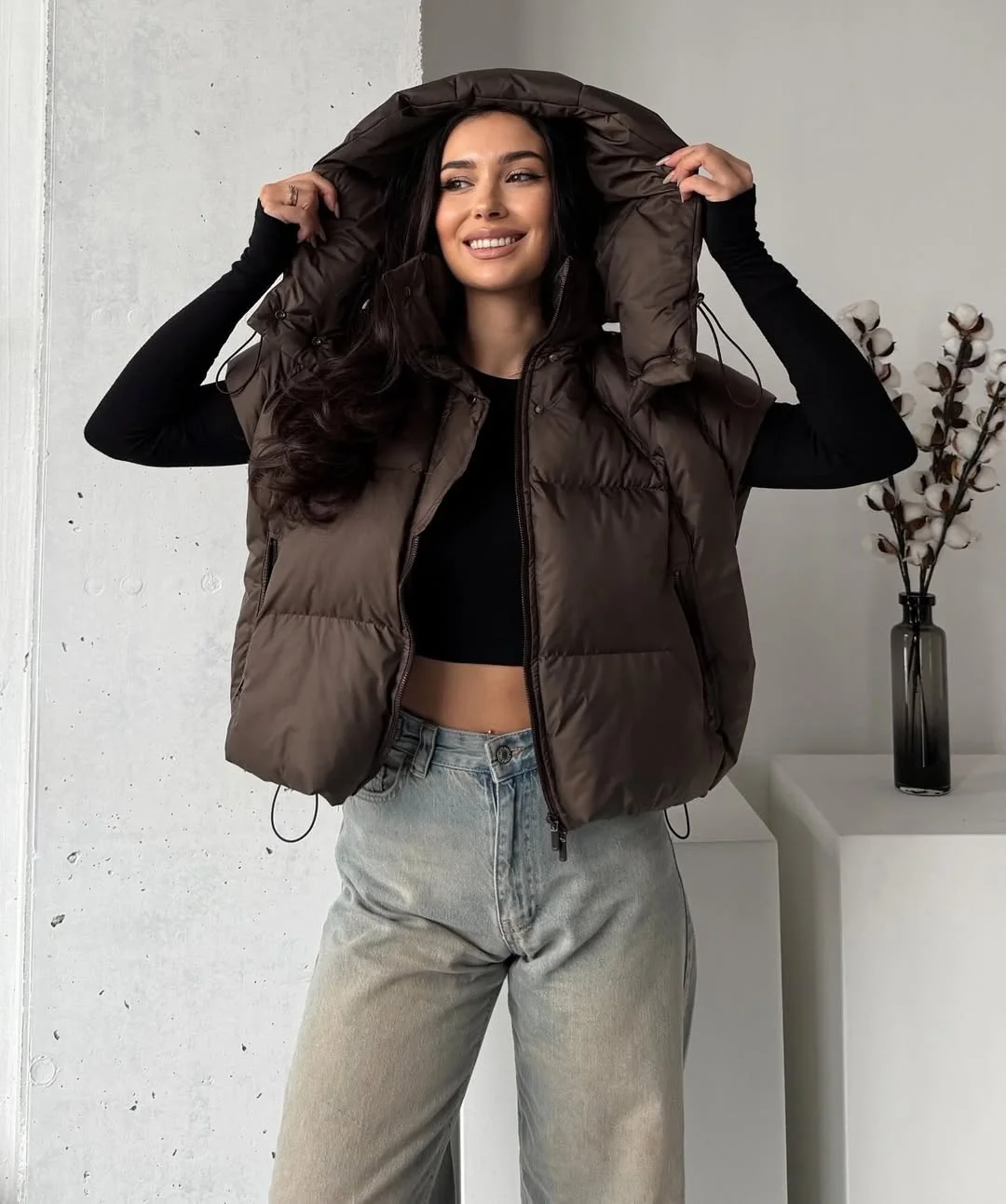 fall outfits with vests 2026 Chocolate Puffer Vests Bring Warmth Without the Bulk