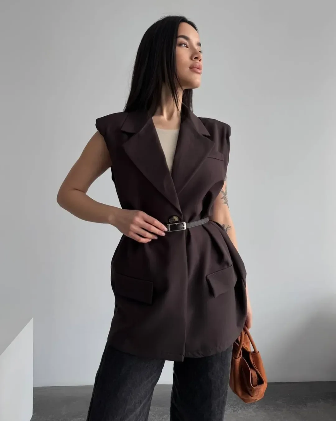 fall outfits with vests 2026 Longline Tailored Vests Make Everyday Denim Feel Luxe