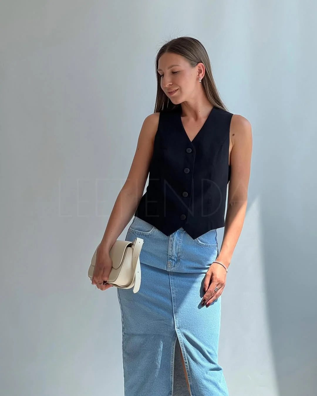 fall outfits with vests 2026 Sharp Black Tailoring Meets Relaxed Denim