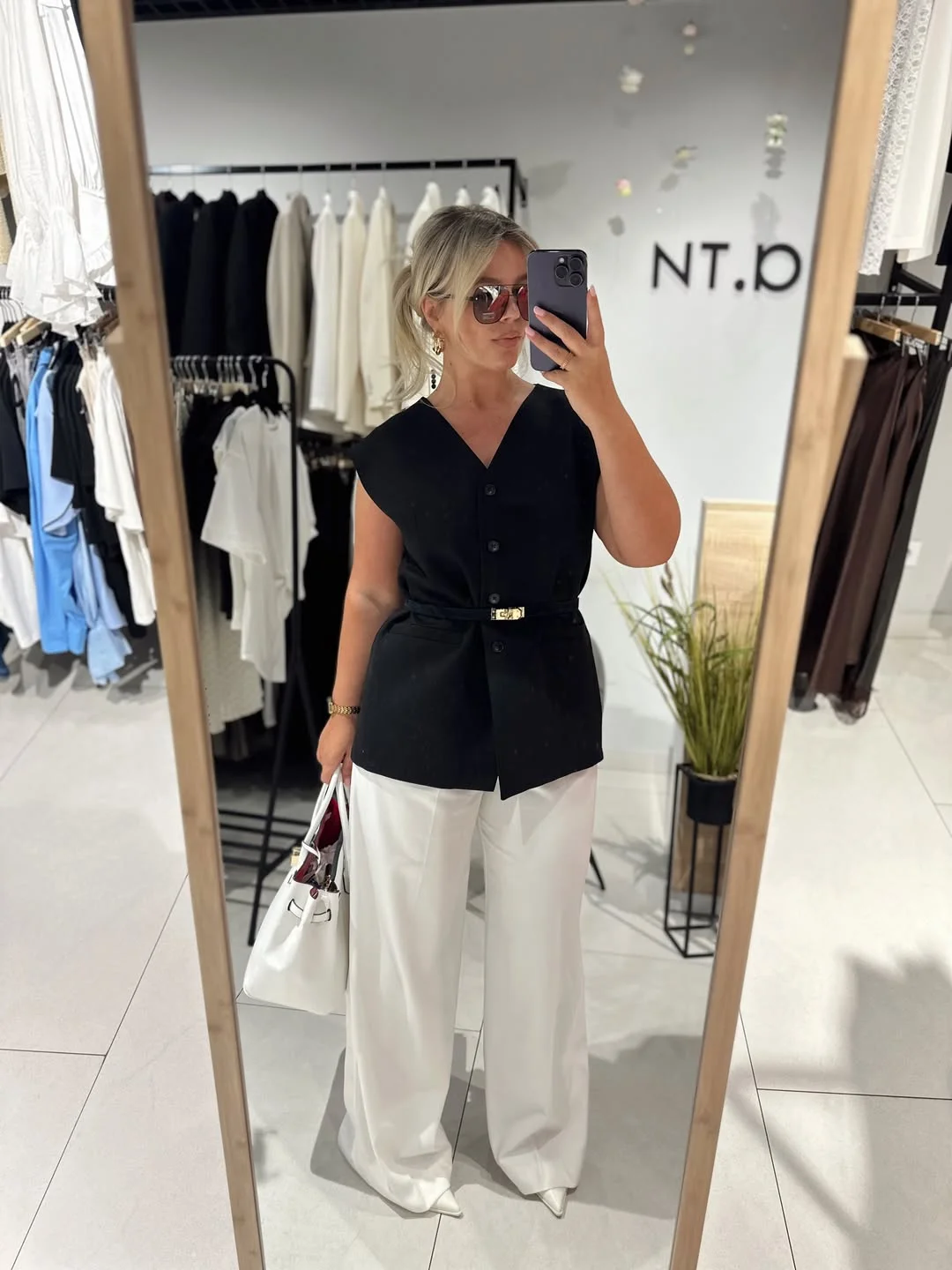 fall outfits with vests 2026 Elegant Monochrome Tailoring with a Longline Vest