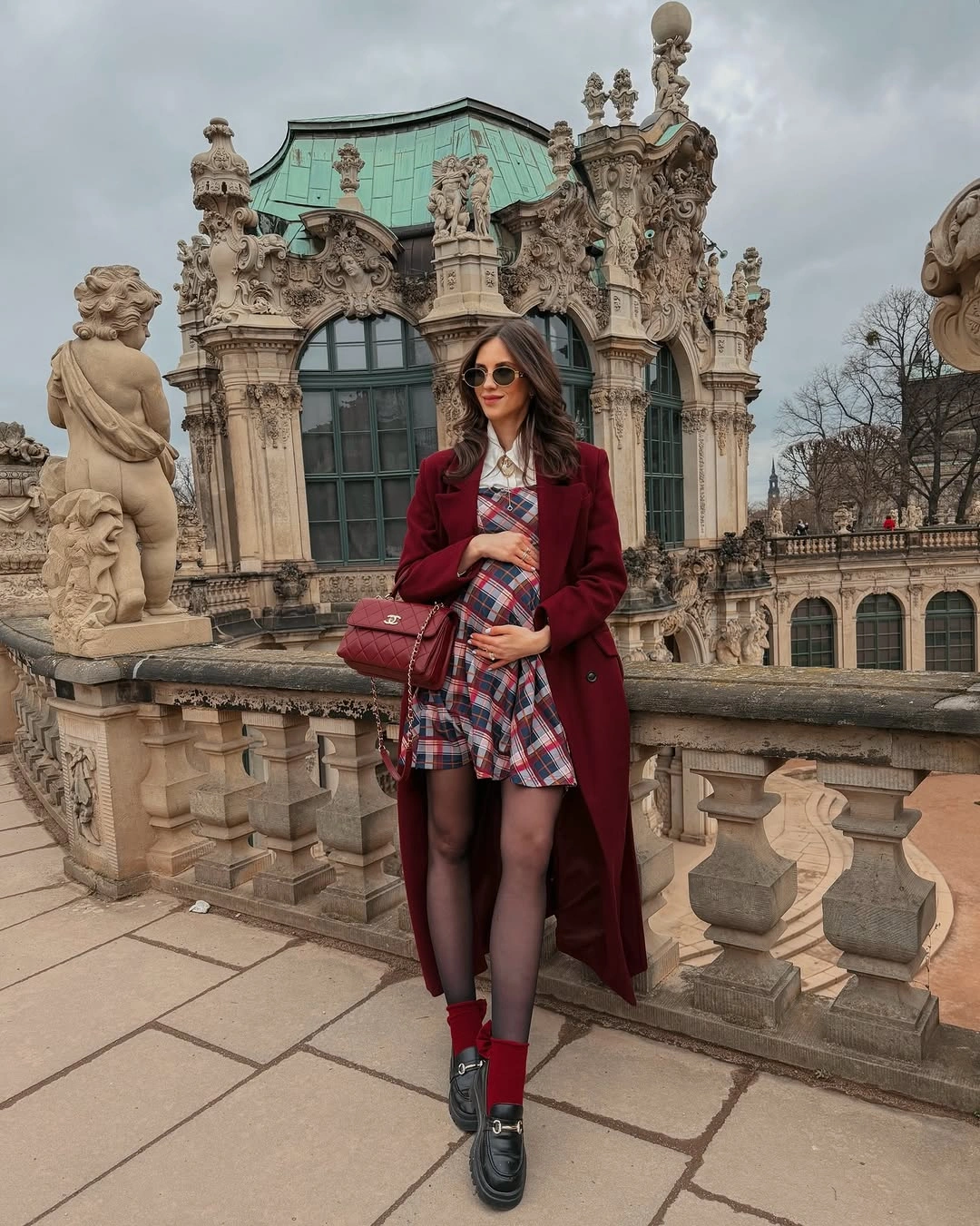 fall pregnancy outfits 2026 A Burgundy Coat Brings Classic Romance to Fall Maternity Style