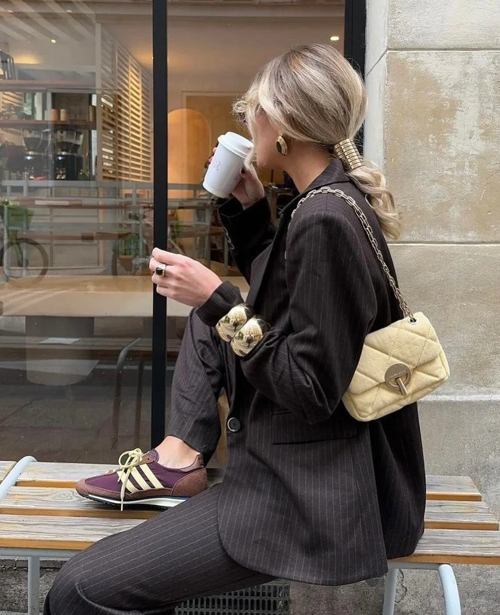 fall street fashion nyc 2026 Pinstripe Tailoring and Retro Sneakers Define Going-Out Style for Fall 2026
