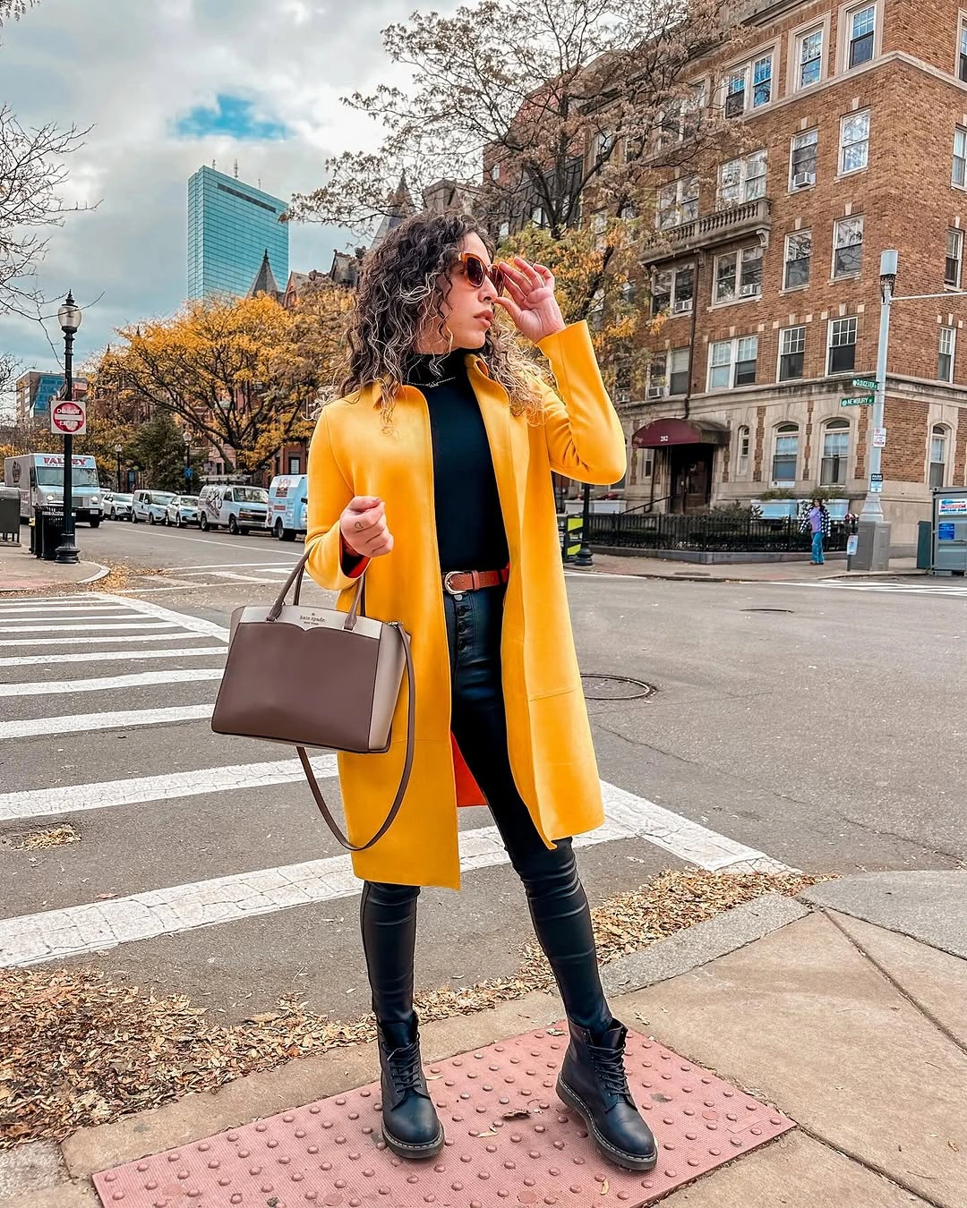 fall travel outfits 2026 A Bold Mustard Coat That Brightens Every City Escape