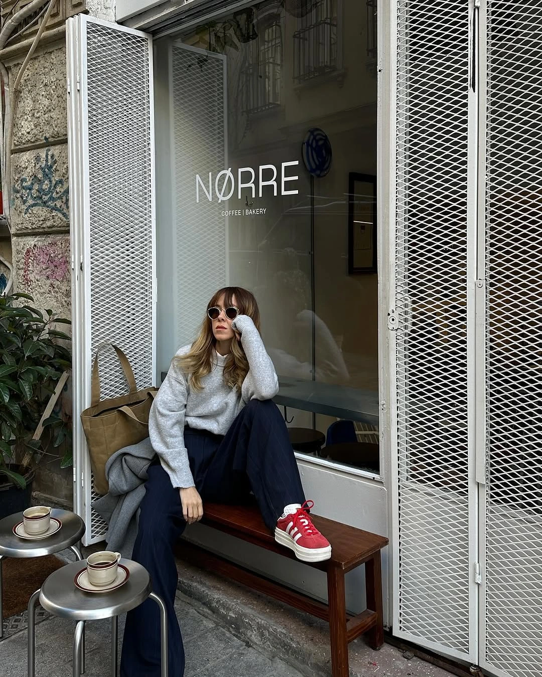 fall travel outfits 2026 Relaxed Café Style with an Unexpected Pop of Color