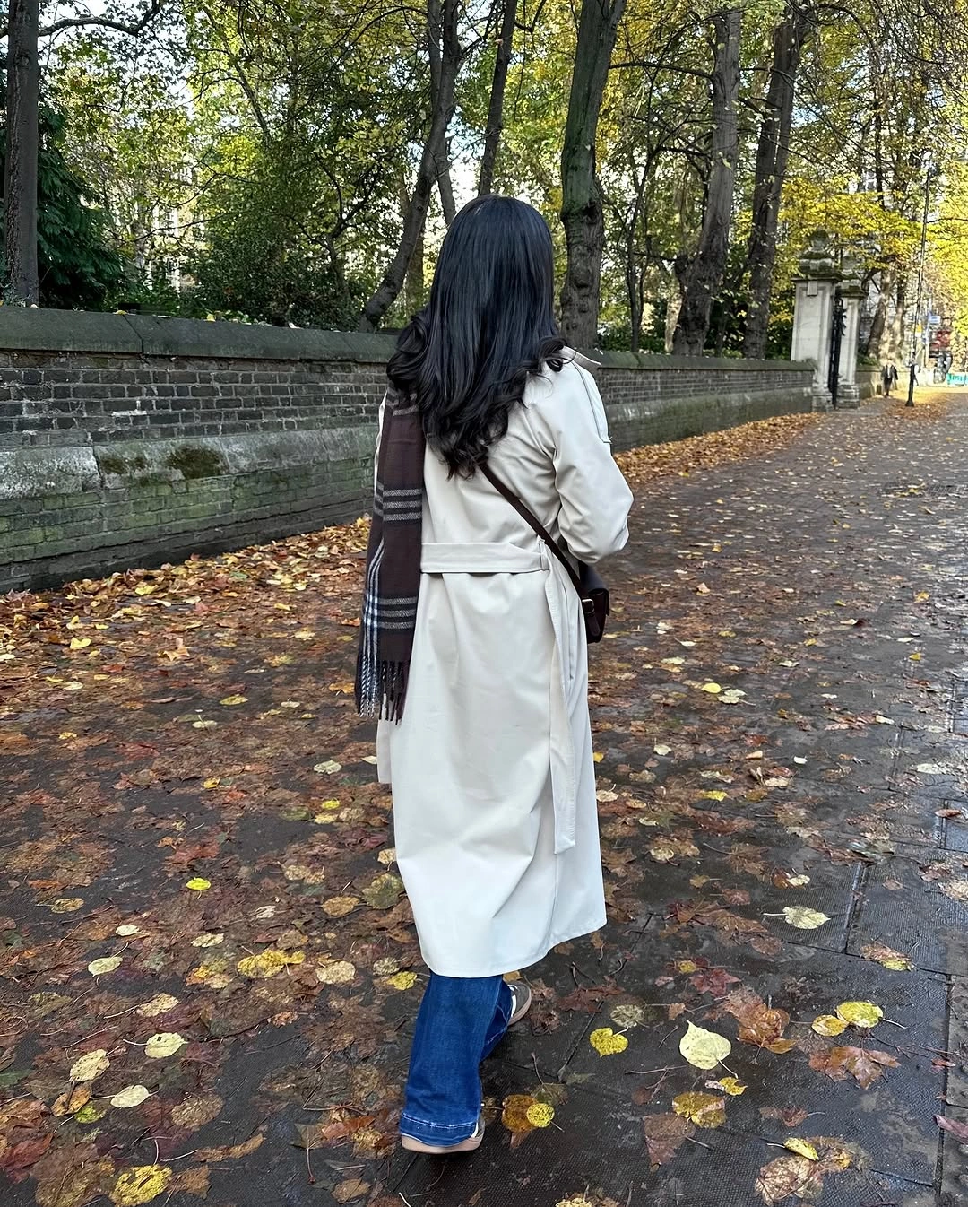 fall travel outfits 2026 A Timeless Trench Coat for Classic European Walks