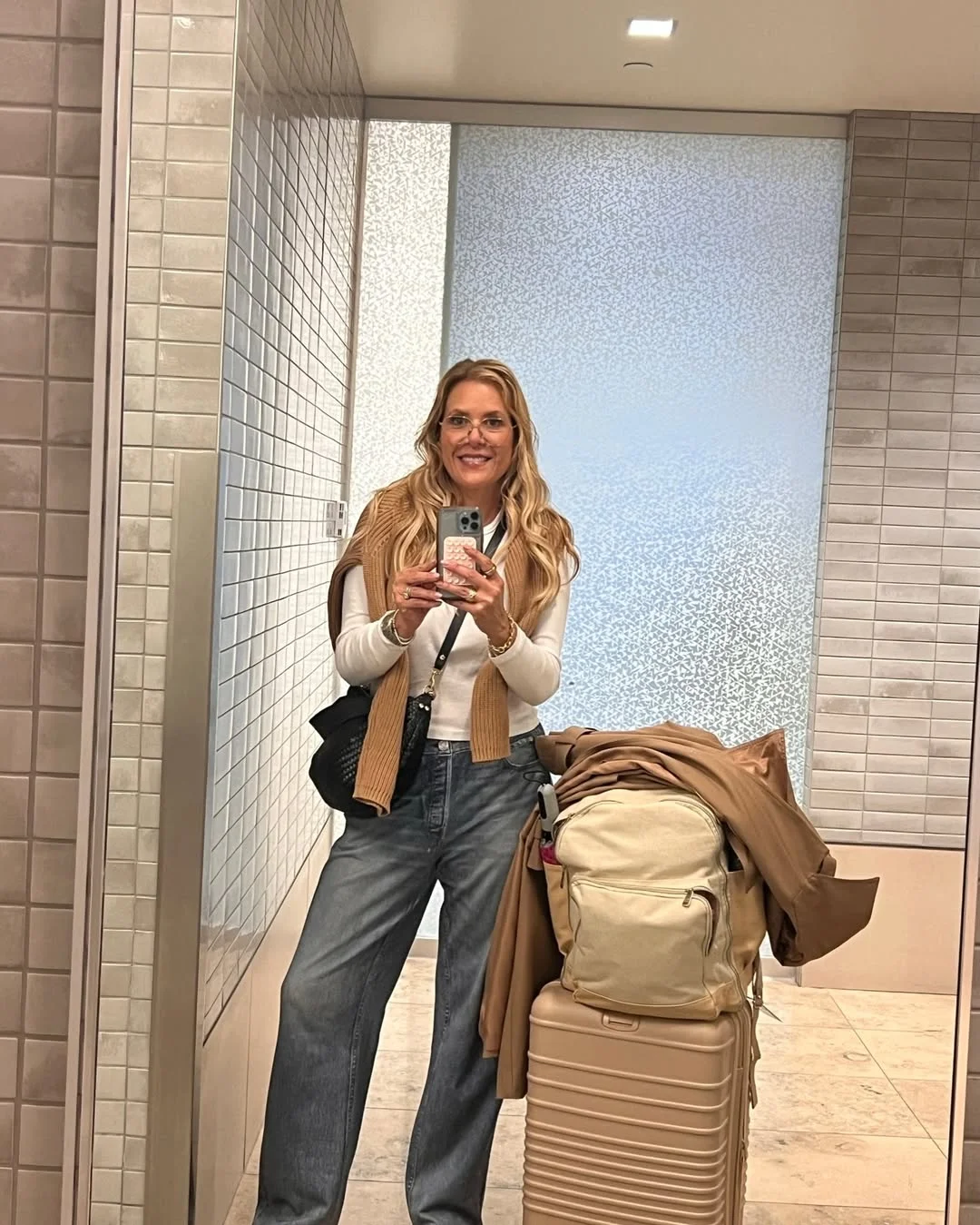fall travel wardrobe for women 2026 Classic Denim Layers That Work From Check-In to City Walks