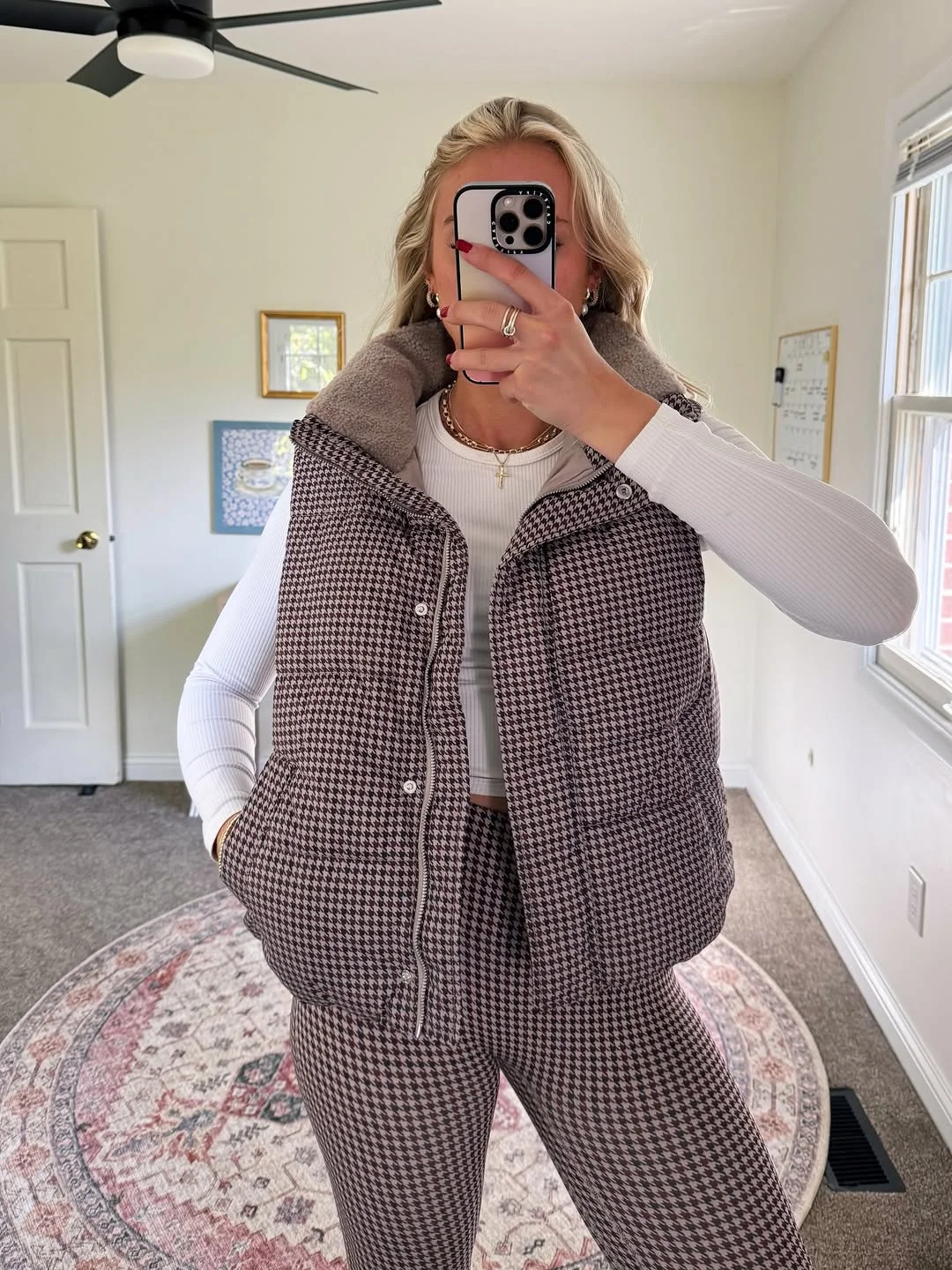 fall vest outfits for women 2026 Houndstooth Puffer Vest That Makes Athleisure Feel Elevated
