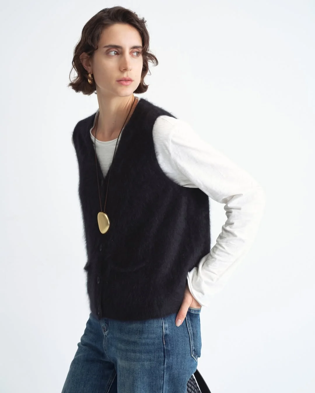 fall vest outfits for women 2026 Soft Black Fuzzy Vest with Relaxed Denim