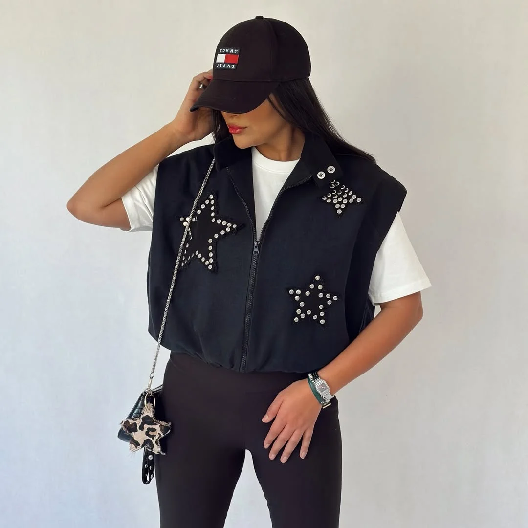 fall vest outfits for women 2026 Black Statement Vest with Modern Street Style Energy