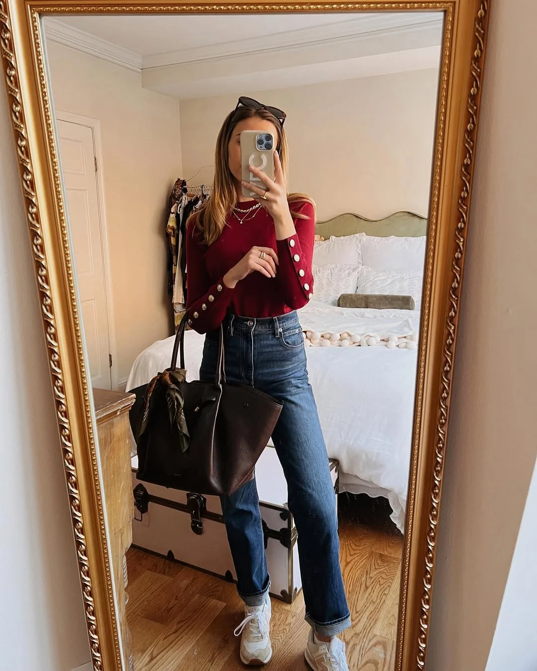 fall work outfits 2026 Dark Denim And A Burgundy Knit For Casual Office Days