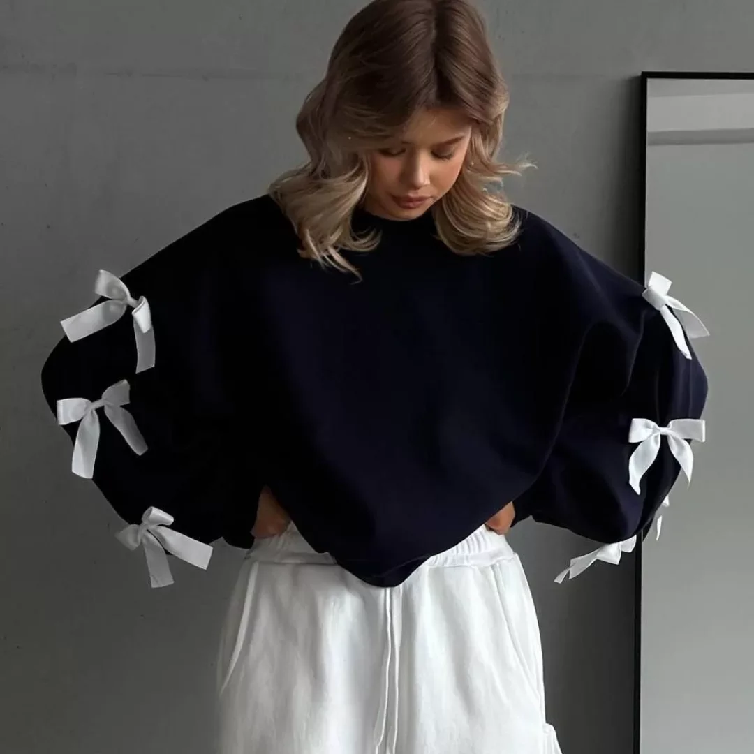 summer to fall outfits 2026 Bow Details Add Playfulness To Cozy Fall Staples