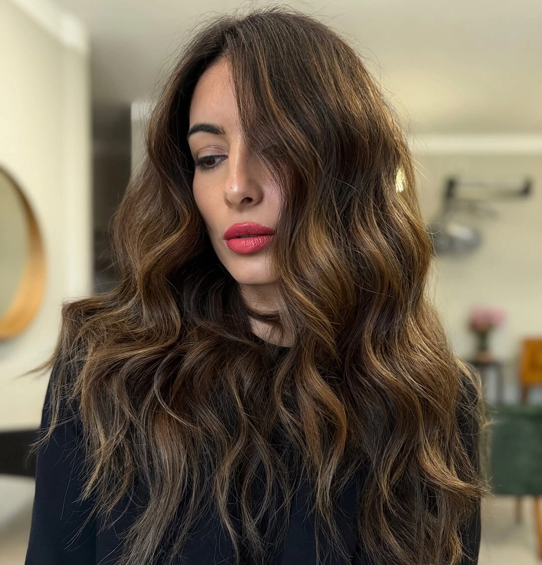 august hairstyles and color ideas 2026 Warm Chestnut Waves With Natural Sunlit Dimension