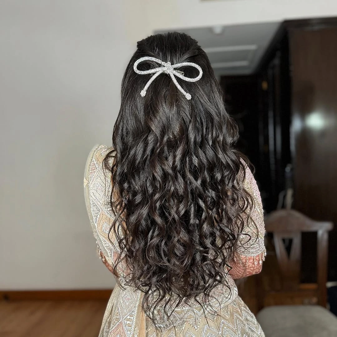 august hairstyles and color ideas 2026 Elegant Half-Up Curly Hairstyle With A Romantic Bow Detail