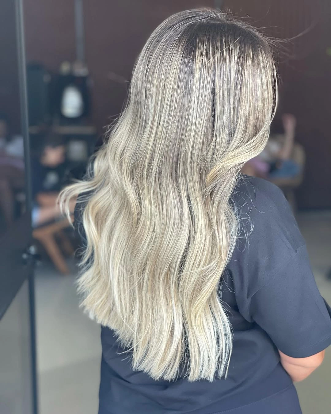 august hairstyles and color ideas 2026 Long Vanilla Blonde Waves With Cool Luxury Dimension