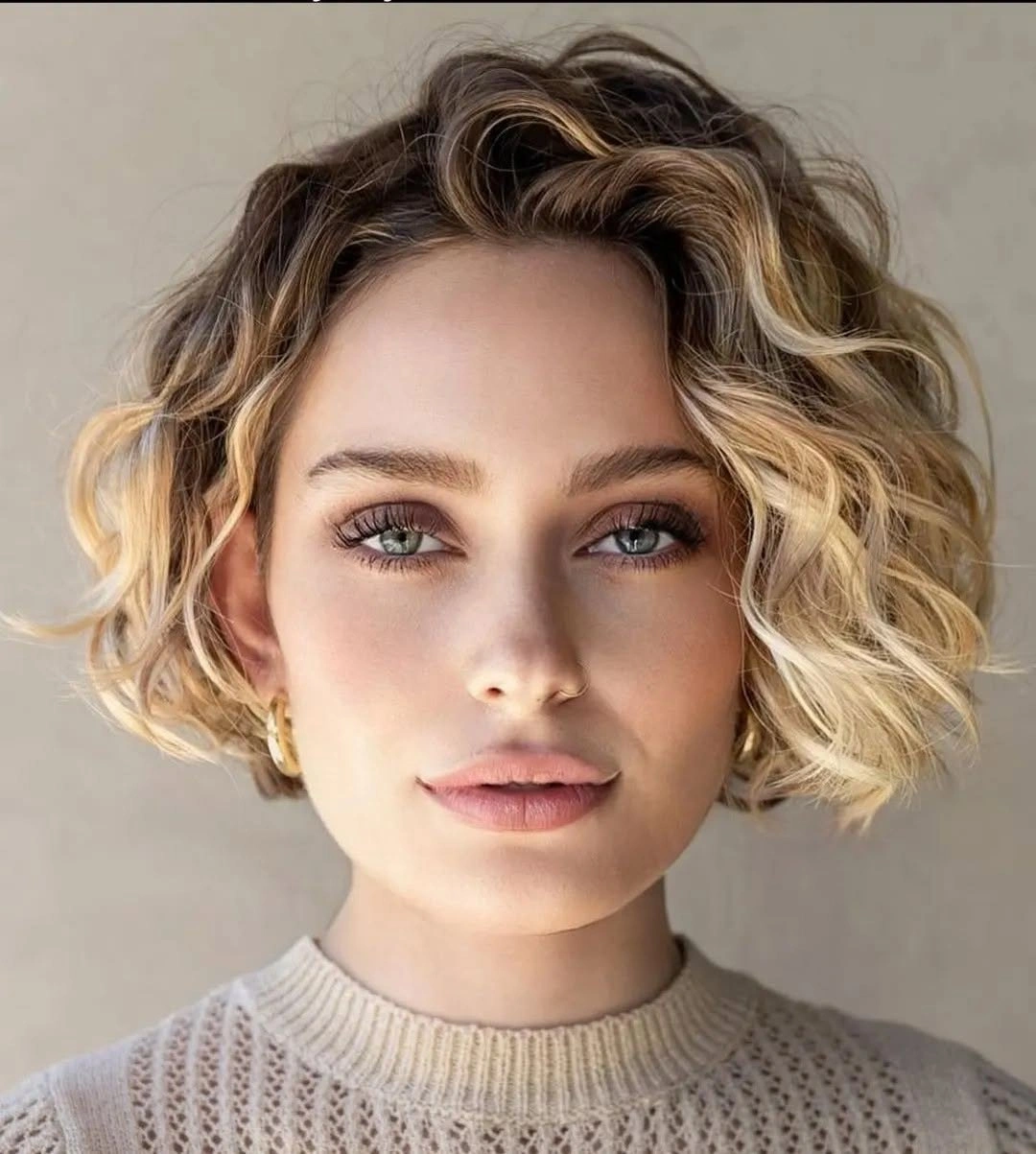august hairstyles and color ideas 2026 Short Curly Blonde Bob With A Playful Modern Shape