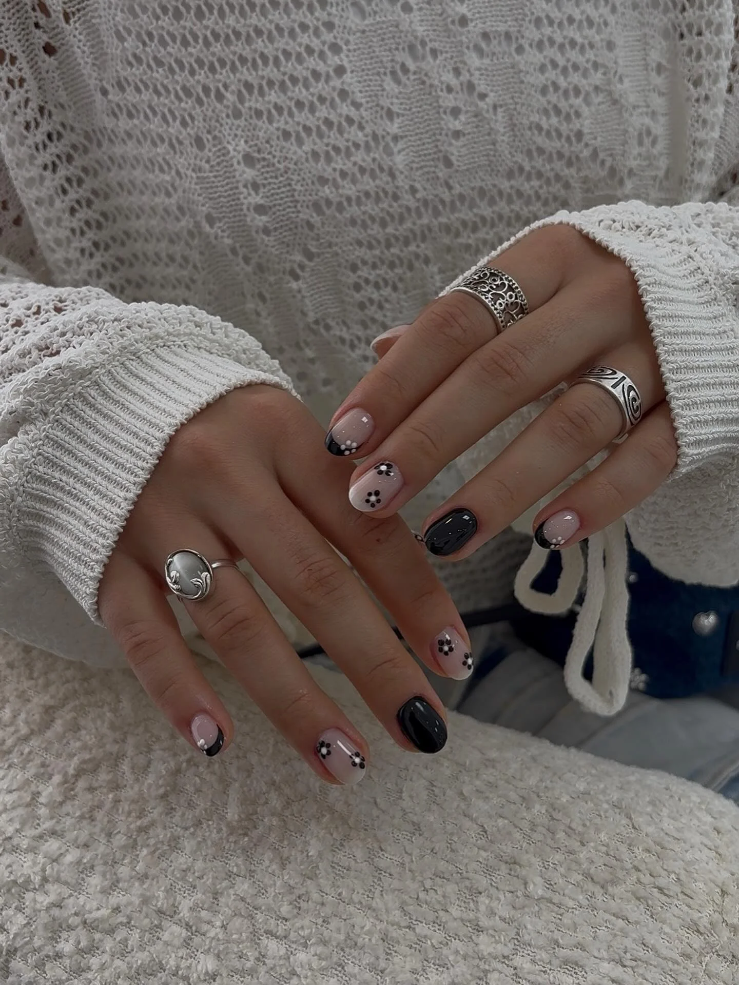 august nails color 2026 Minimal Black and Nude Nails with Delicate Floral Details