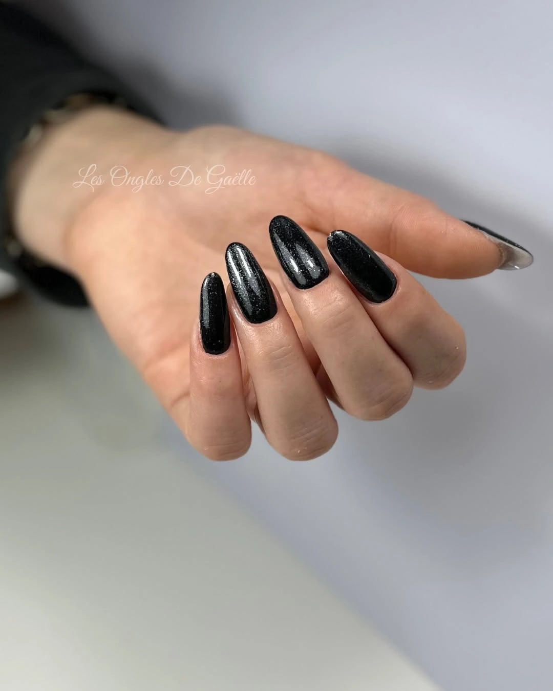 august nails color 2026 Glossy Black Shimmer Nails That Never Go Out of Fashion