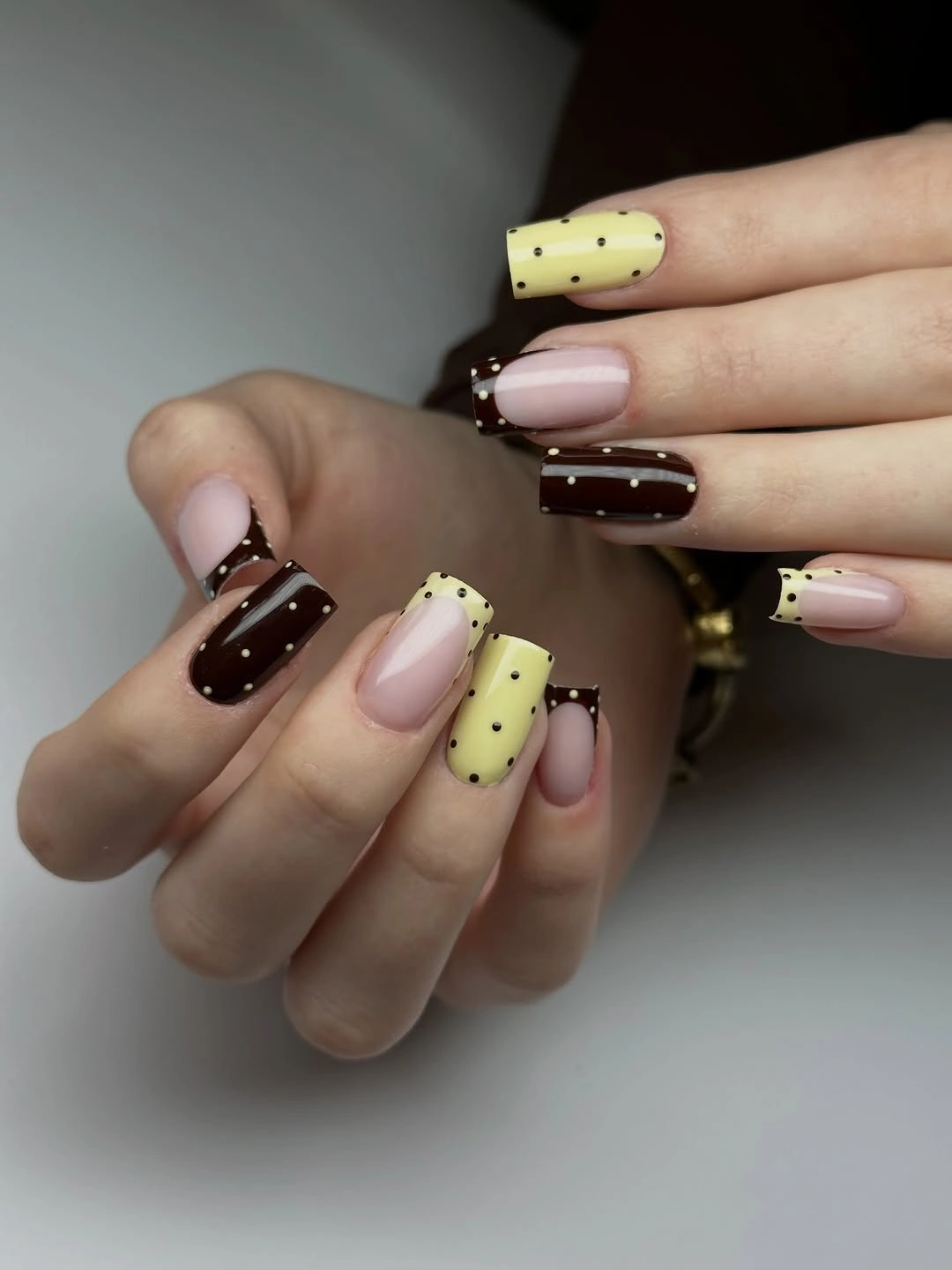 august nails color 2026 Chocolate Brown and Butter Yellow Nails with a Retro Twist