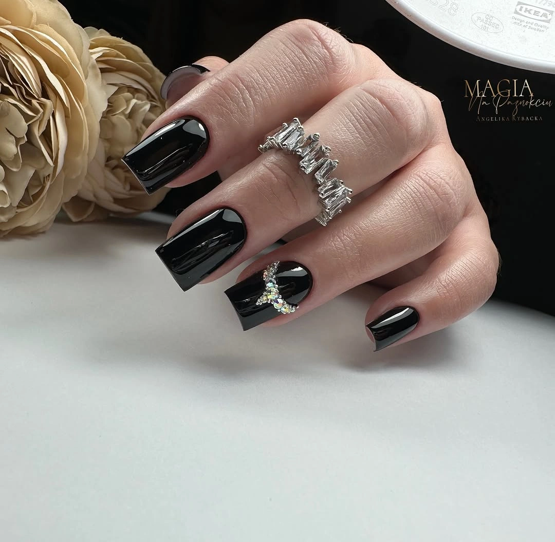 august nails color 2026 Glossy Black Nails with Crystal Accents for Timeless Elegance