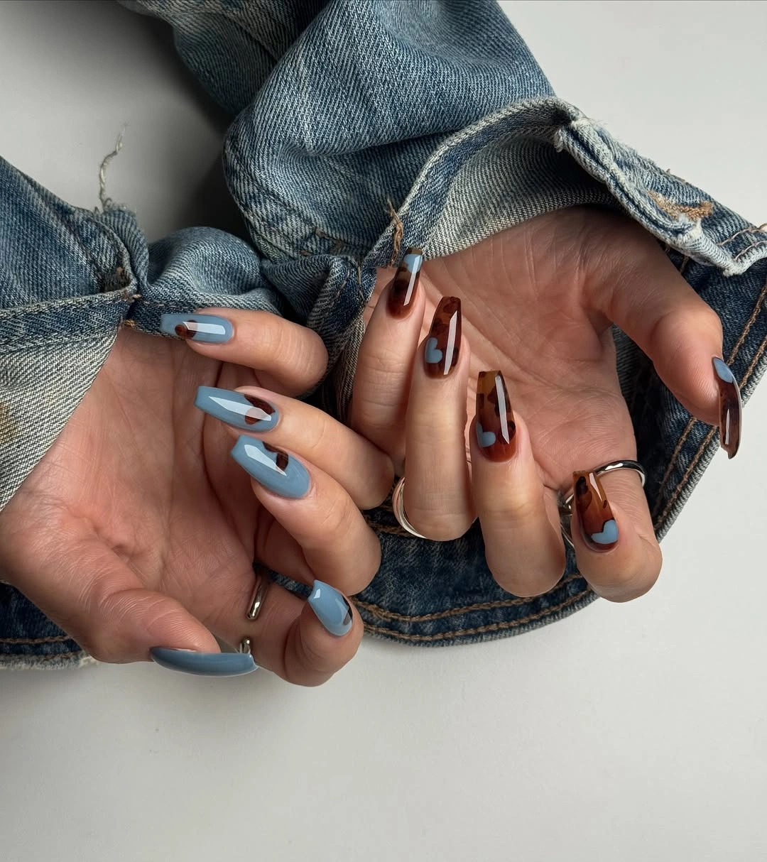august nails ideas 2026 Blue and Chocolate Nails with a Fashion-Forward Twist