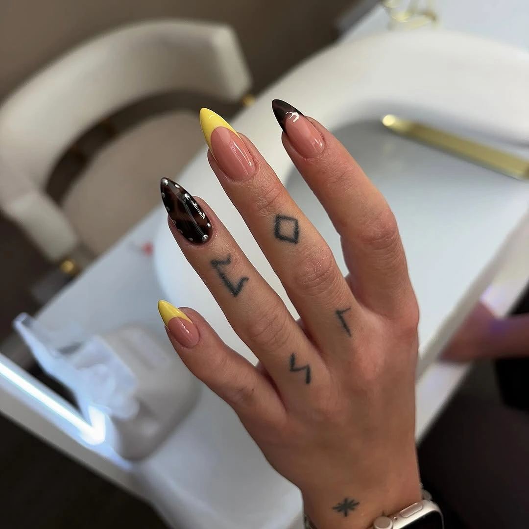 august nails ideas 2026 Sunny French Tips with a Modern Almond Shape