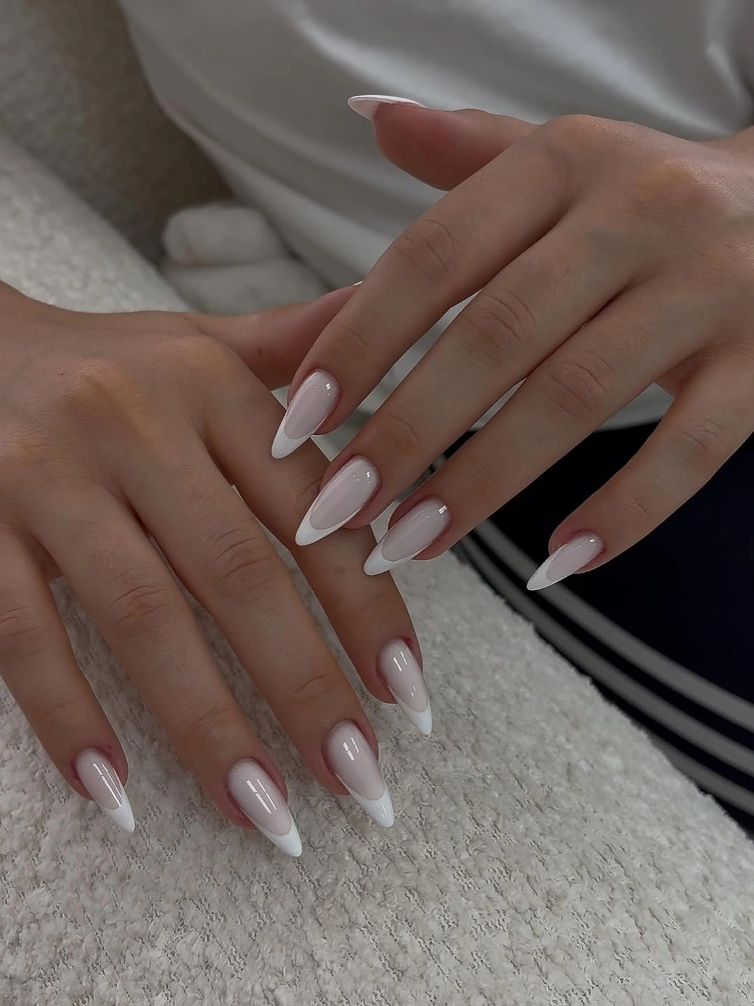 august nails ideas 2026 Classic White French Tips on Elegant Almond Nails