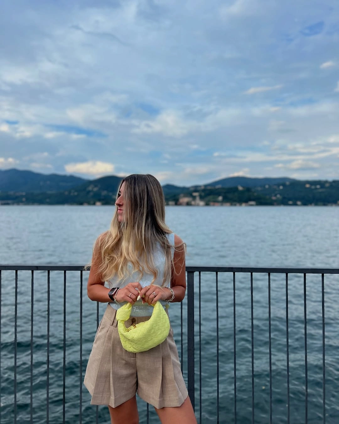 august outfits 2026 Tailored Shorts and Bright Accessories for Lakeside August Days