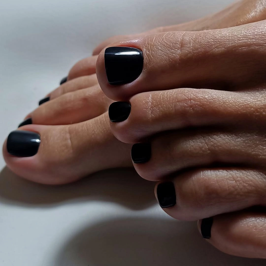 august pedicure nails ideas 2026 Glossy Black Pedicure With A Minimal Chic Style