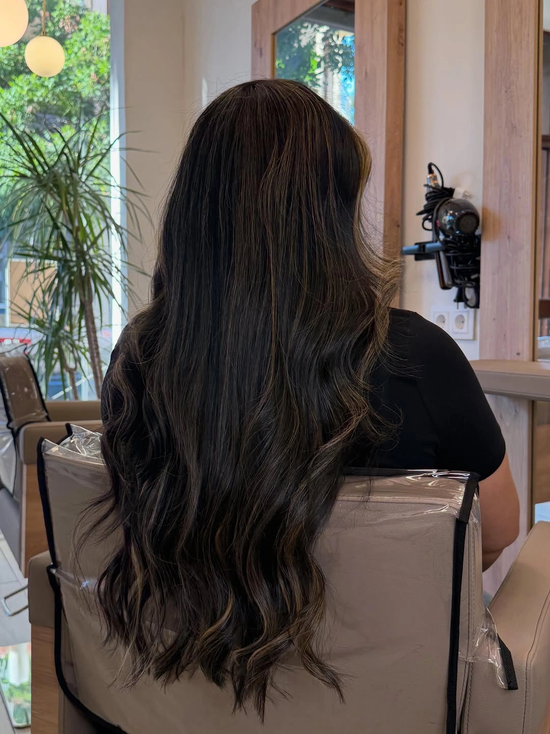 babylights hair ideas Deep Brunette Waves with Barely-There Babylights