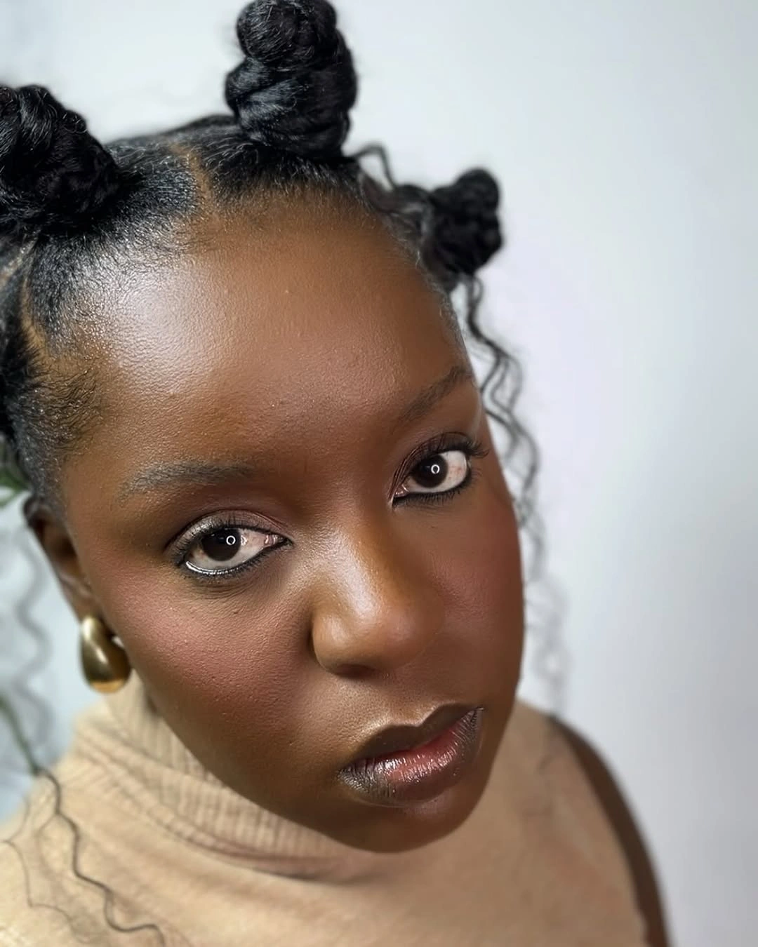 bantu knots hairstyles Minimalist Bantu Knots With Soft Face-Framing Tendrils