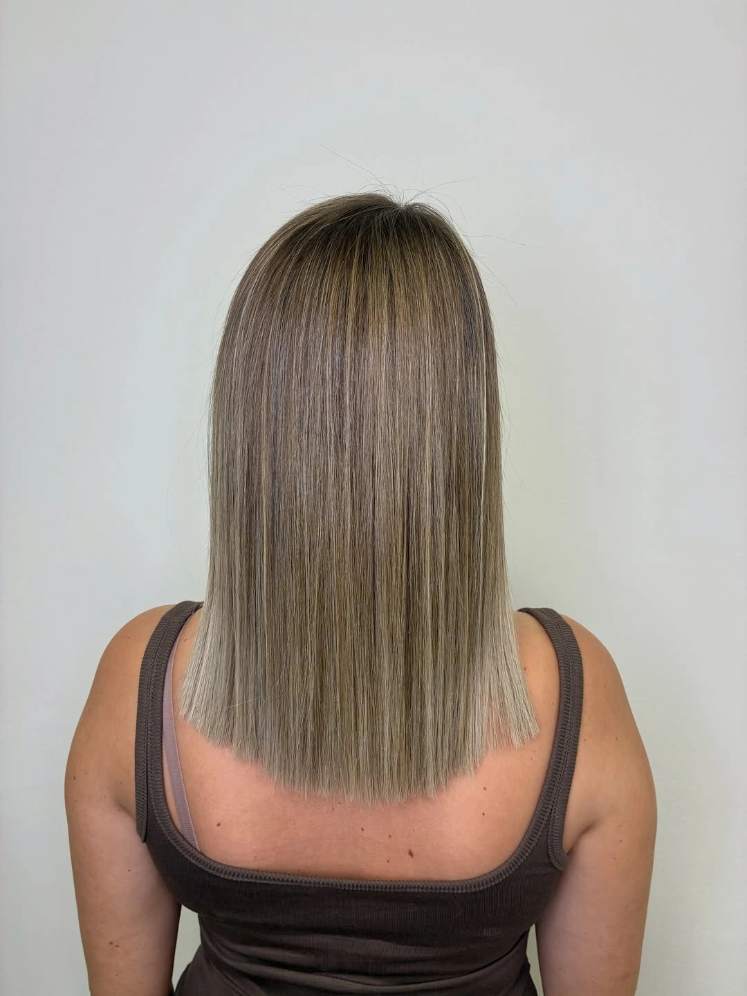 beige blond hair color Sleek Cool Beige Blonde Blunt Lob