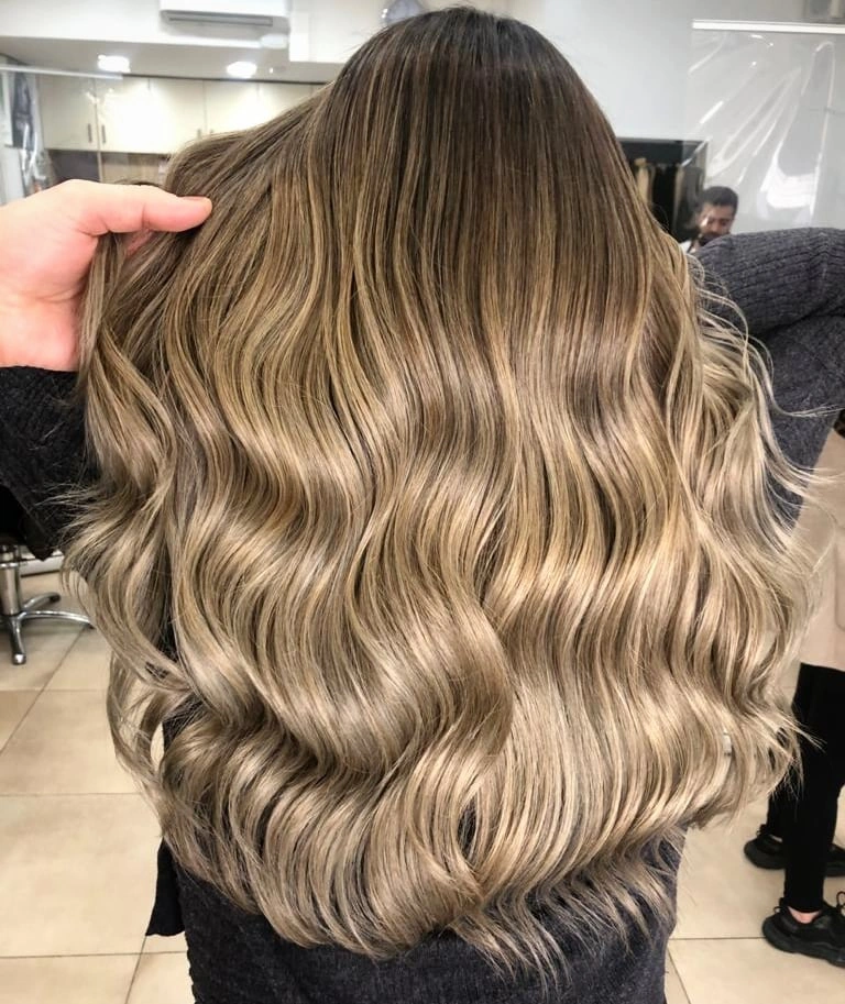 beige blond hair color Glossy Beige Blonde with Seamless Root Melt