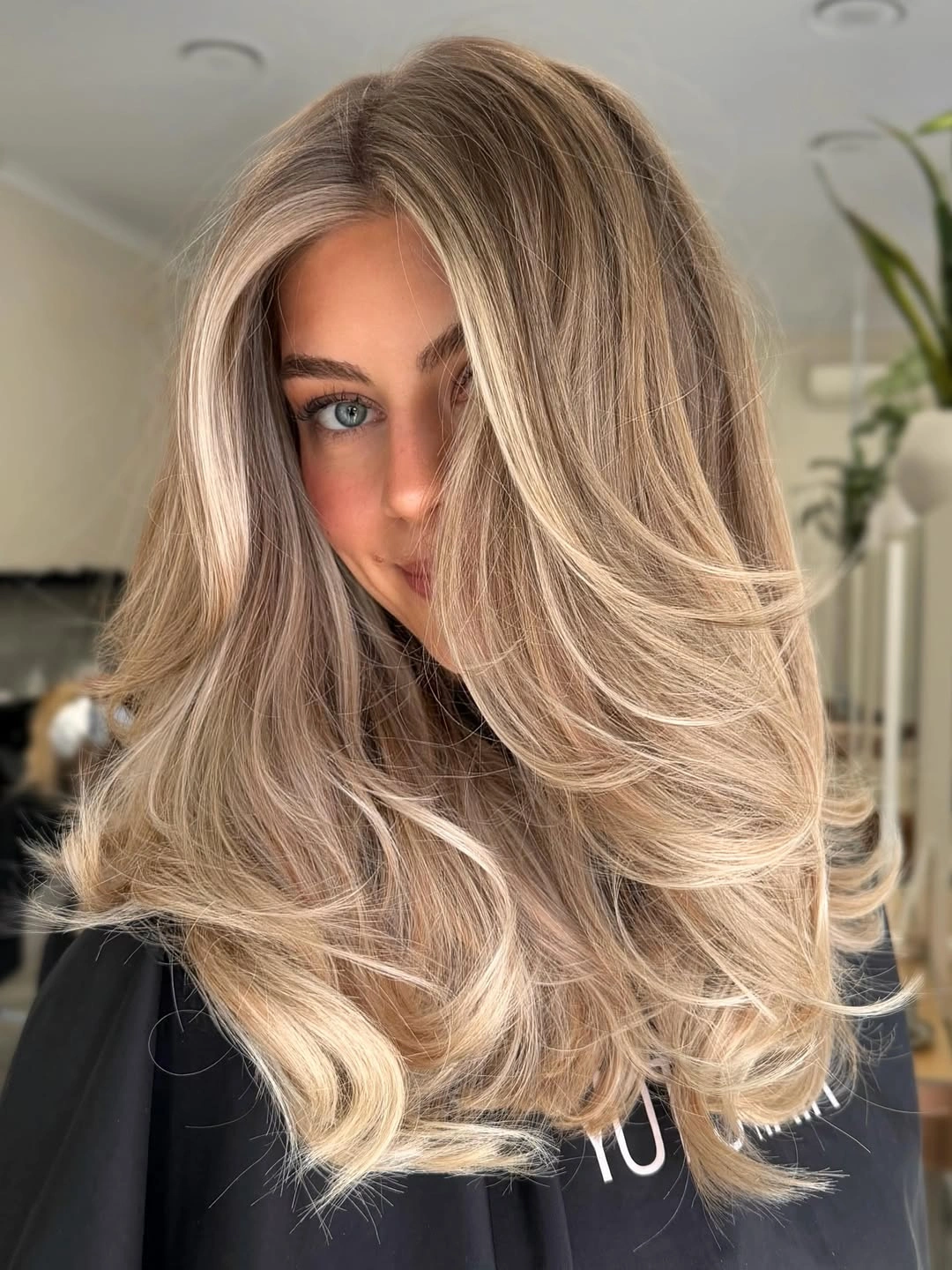beige blond hair color Airy Beige Blonde with Feathered Layers