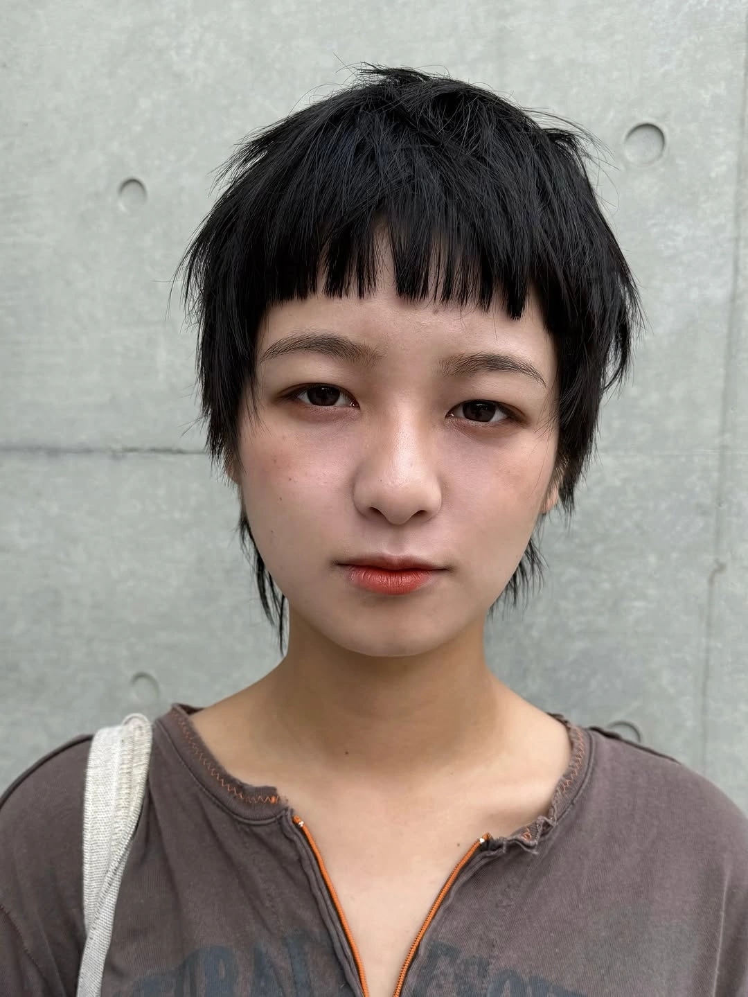 bixie haircut Graphic Micro Bangs with Artistic Minimalism