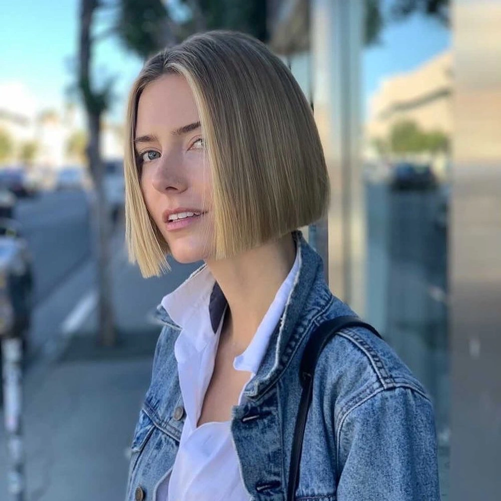bobbed haircut for women Sharp Blonde Blunt Bob with Clean Architectural Lines