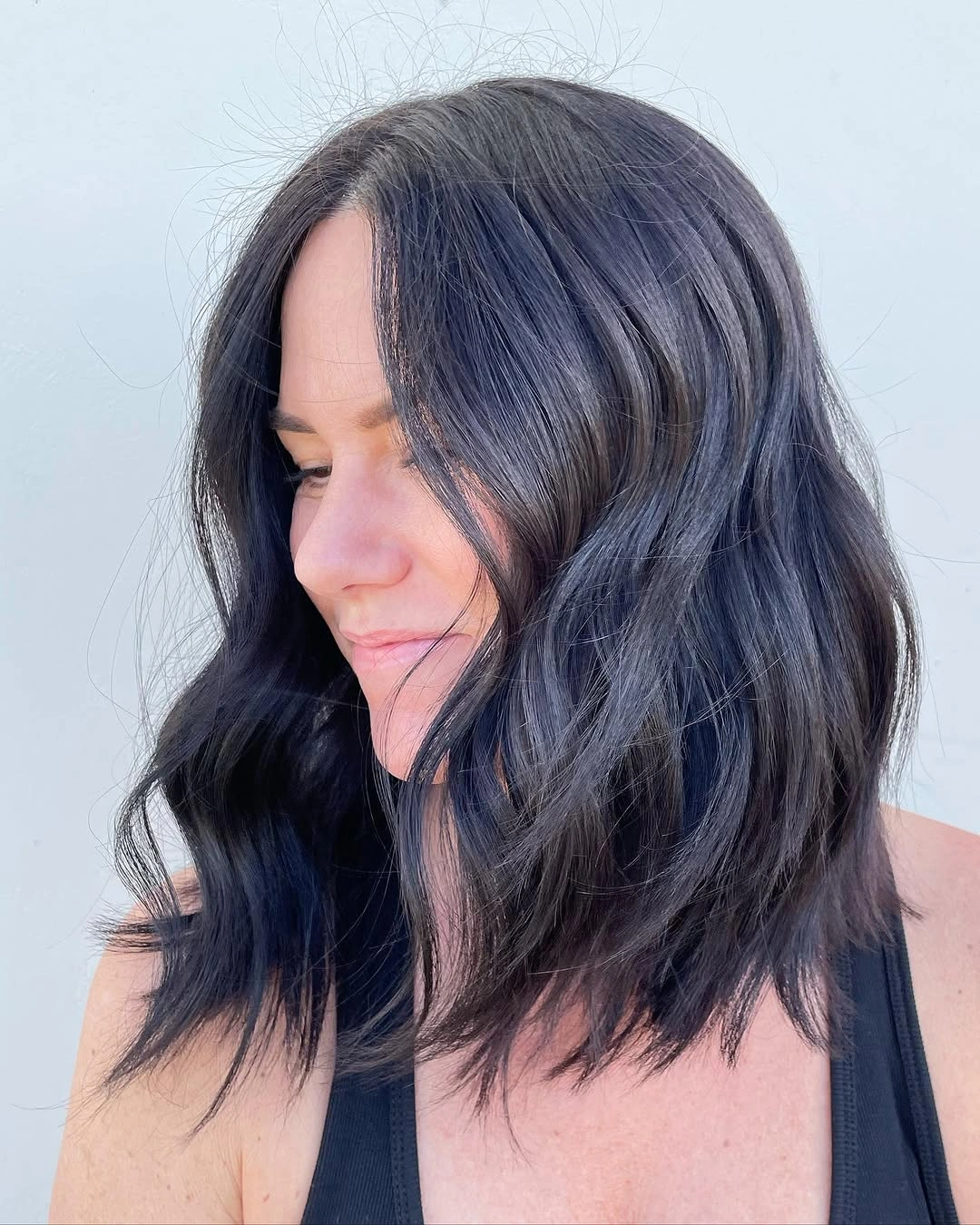 bobbed haircut for women Soft Black Lob with Face-Framing Curtain Layers