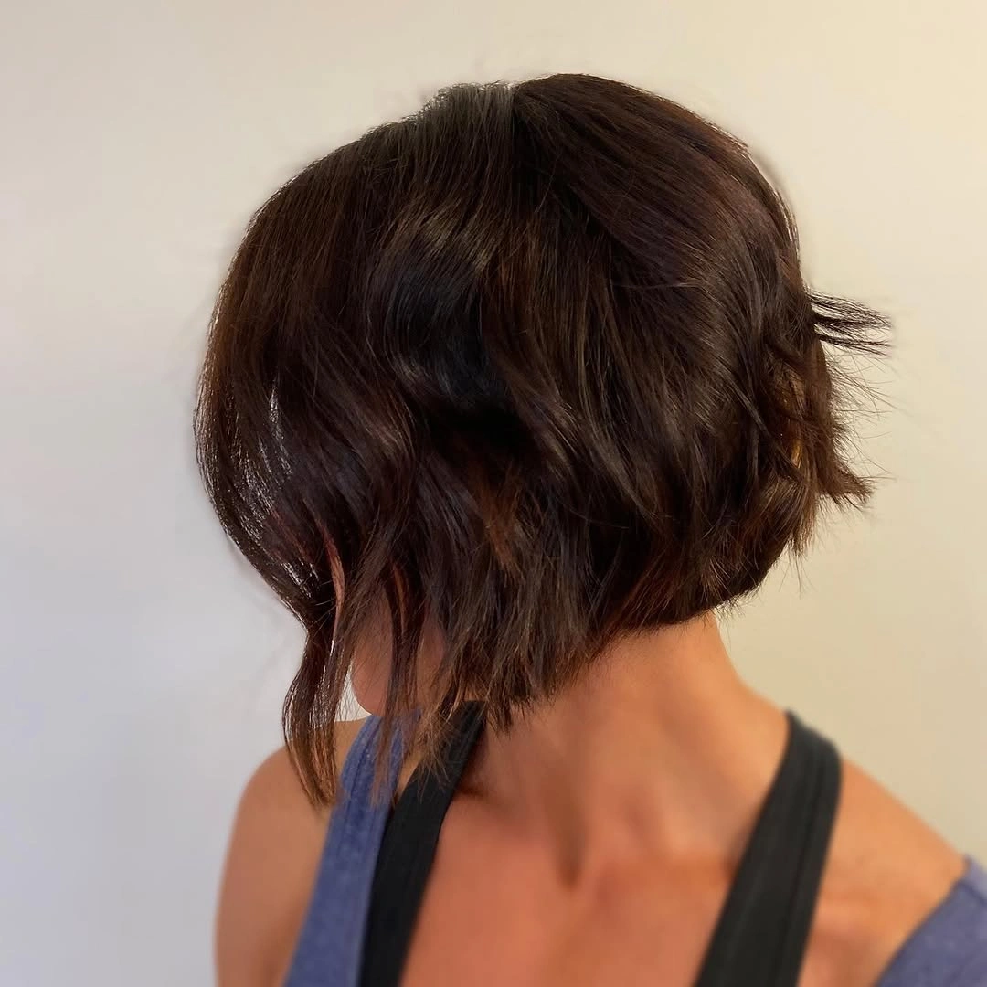 bobbed haircut for women Tousled Layered Brunette Bob with Casual Volume