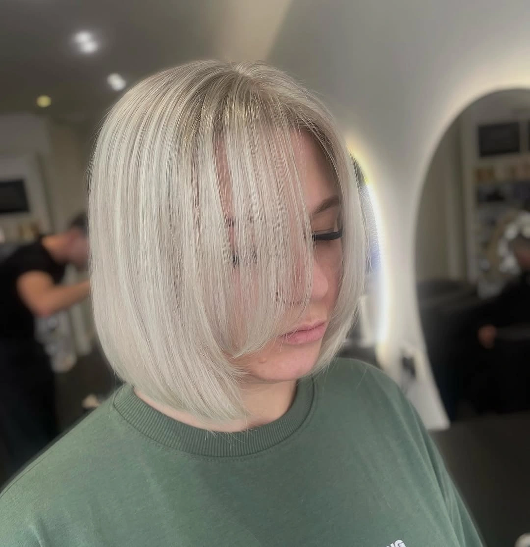 bobbed haircut for women Soft Platinum Bob with Airy Curtain Fringe