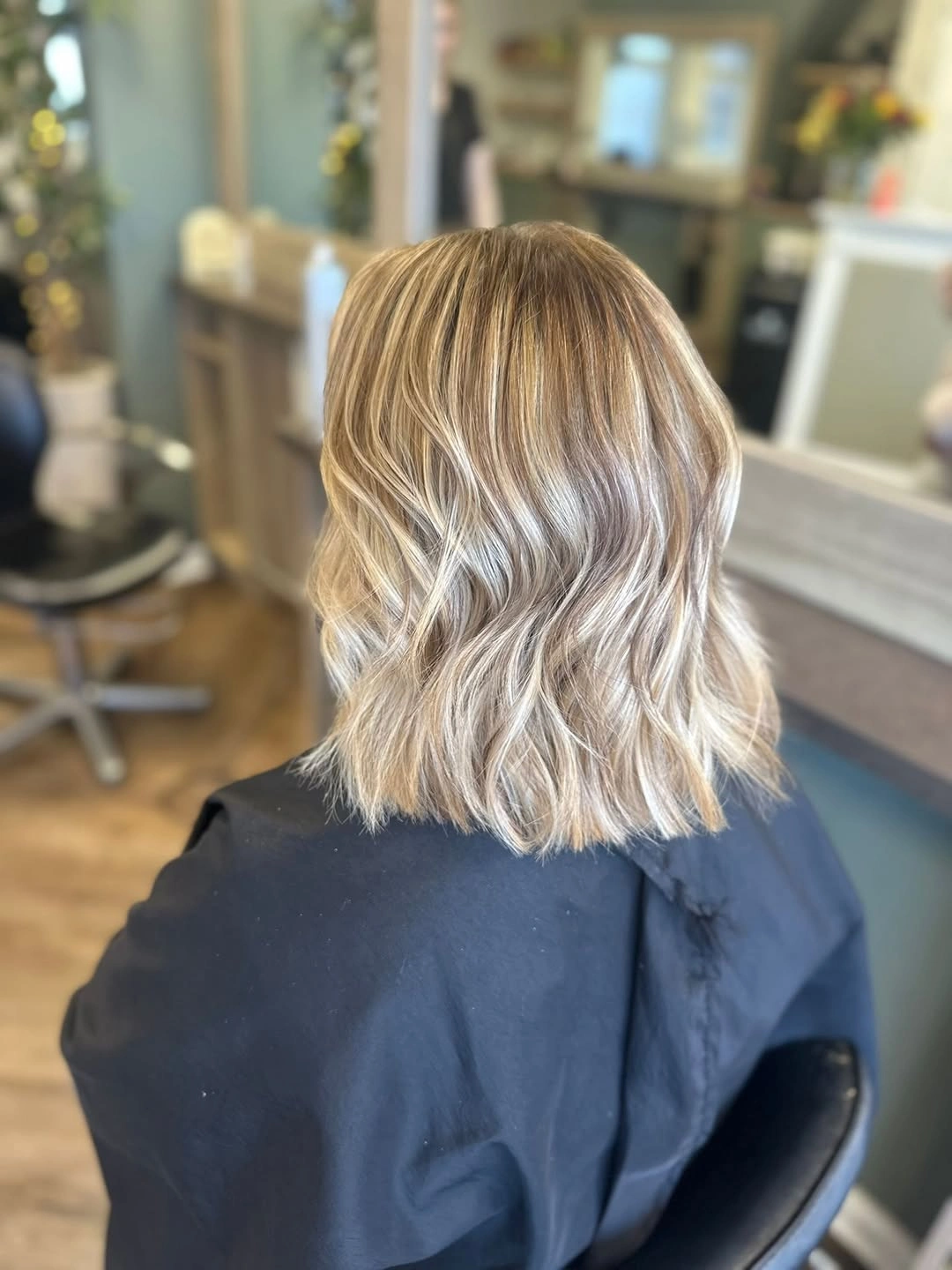 bobbed haircut for women Soft Blonde Wavy Bob with Lived-In Dimension