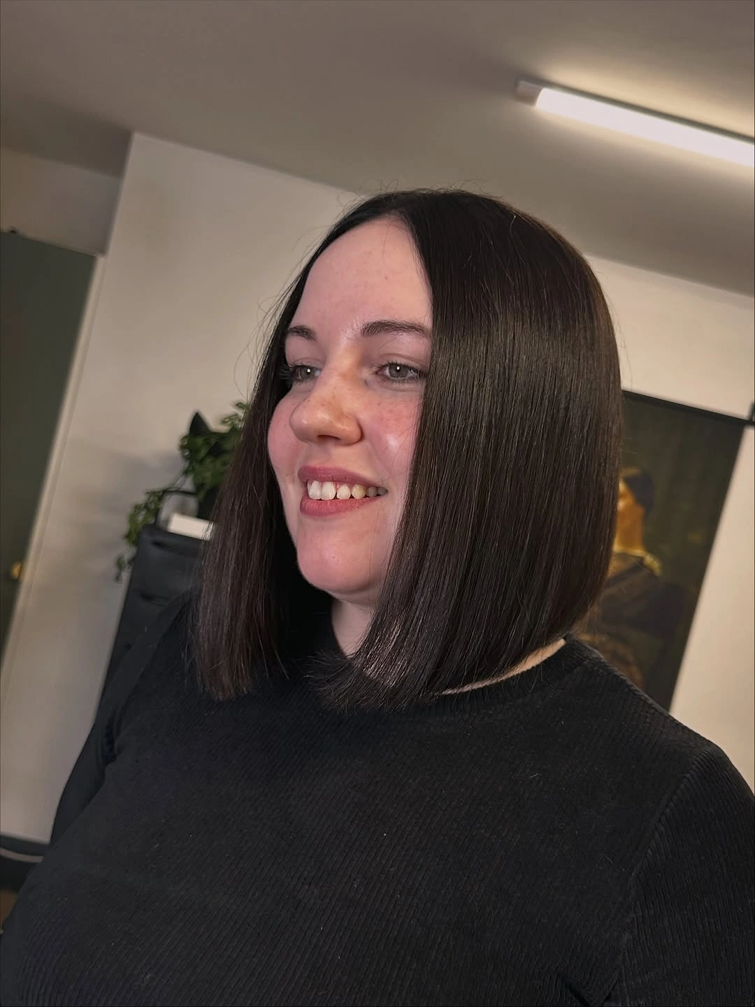 bobbed haircut for women Minimalist Sleek Center-Part Bob