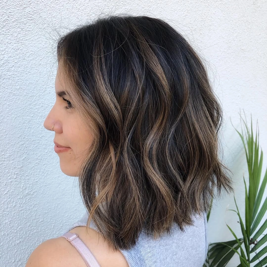 bobbed haircut for women Soft Textured Brunette Bob with Sunlit Dimension