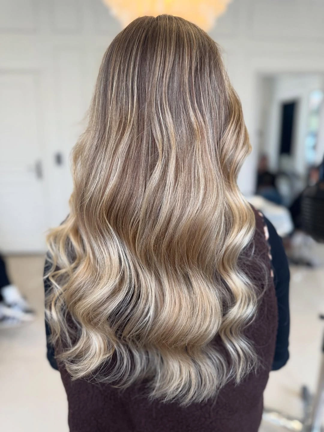 body waves hairstyle Champagne Blonde Waves With a Luxurious Finish