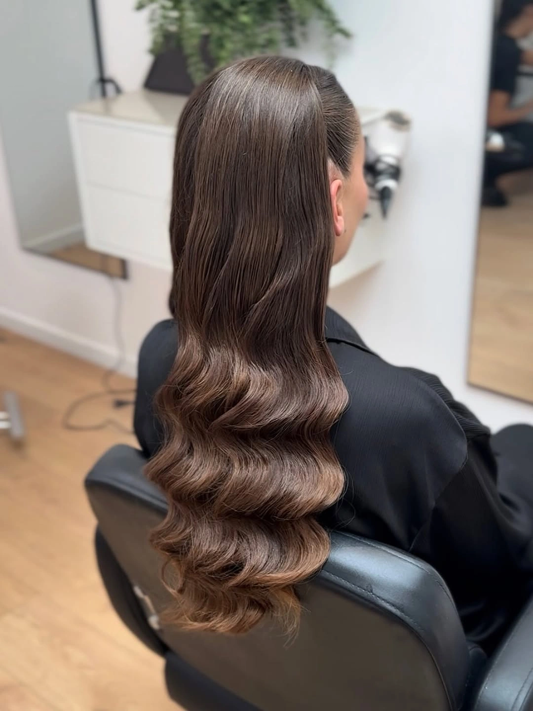 body waves hairstyle Glossy Hollywood Waves With a Modern Finish