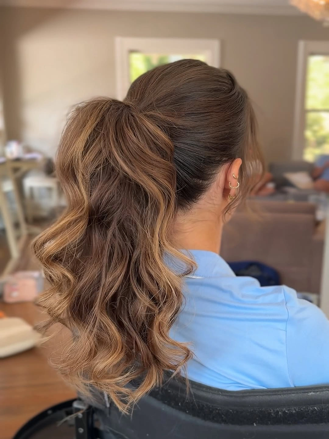 bridesmaid hairstyling High Ponytail with Soft Caramel Waves