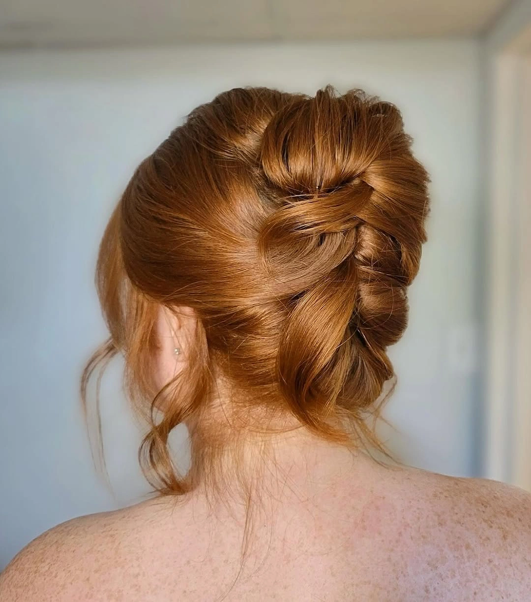 bridesmaid hairstyling Warm Copper Textured Updo with Artistic Detail